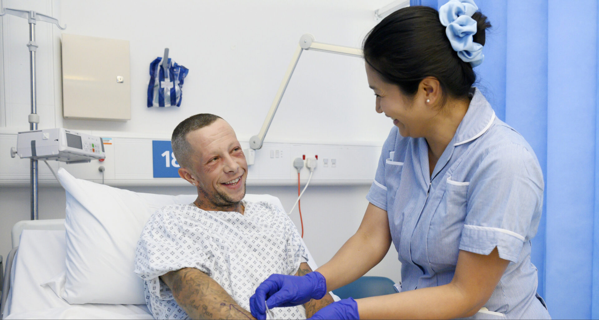 Patient in day surgery with nurse